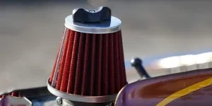 A red conical engine air filter