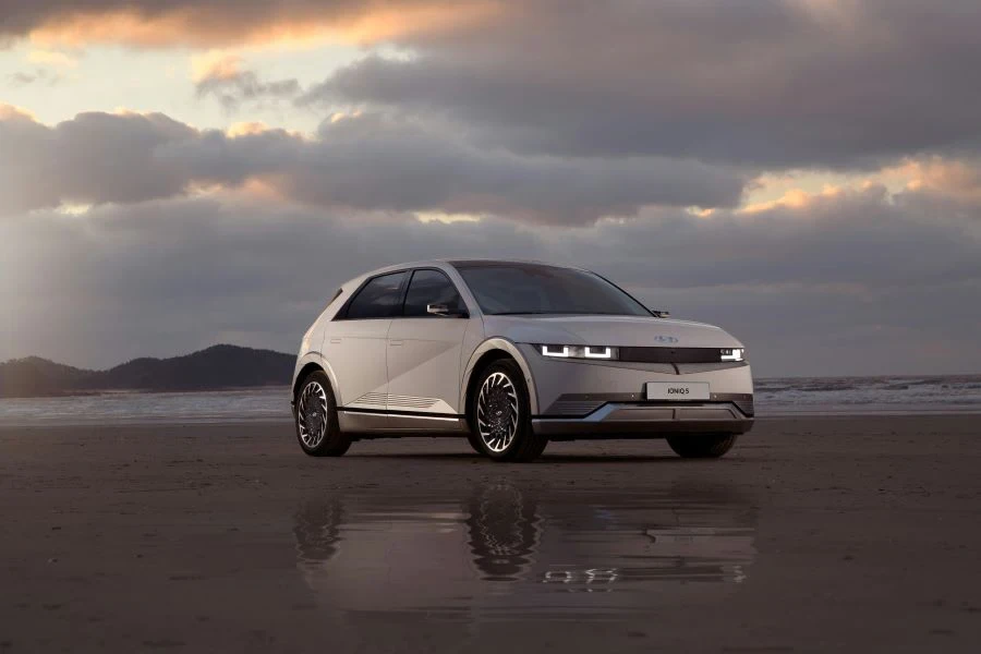 A white Hyundai IONIQ 5 on a beach