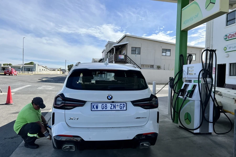 BMW X3 car at a gas station