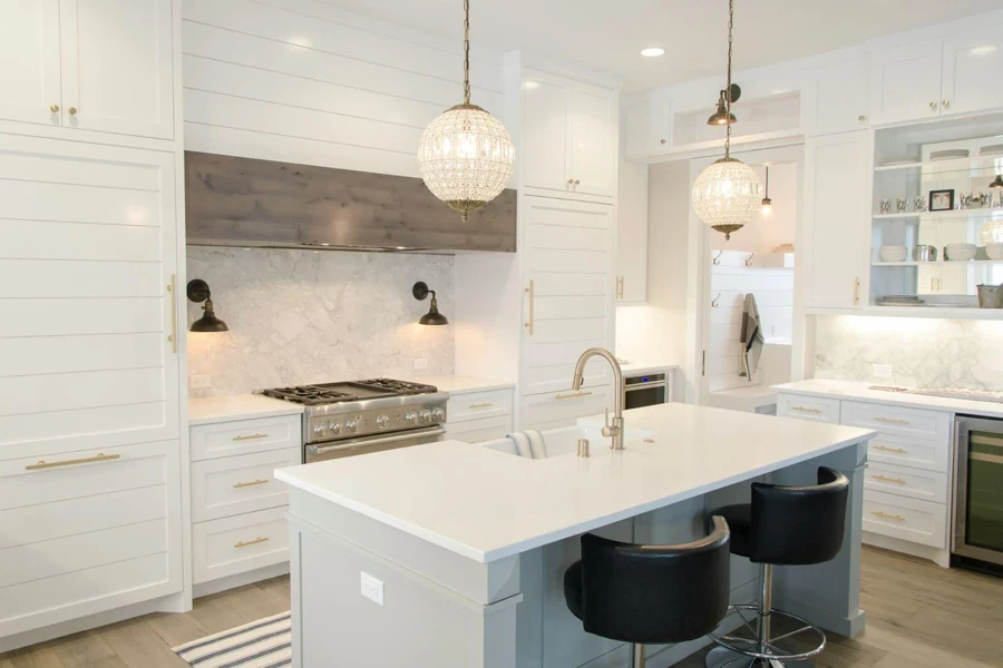 White multifunctional island in modern kitchen