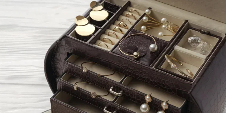 A black jewelry organizer with different sections