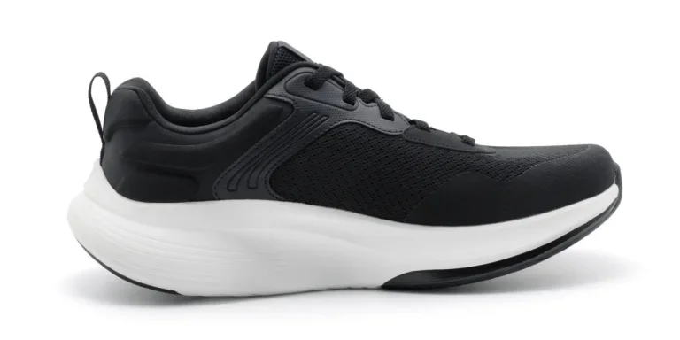 A black unbranded carbon-plated shoe on a white background