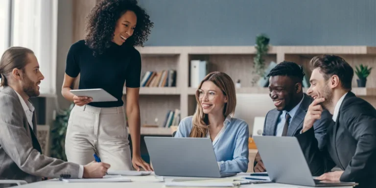 A group of happy businesspeople discussing a strategy