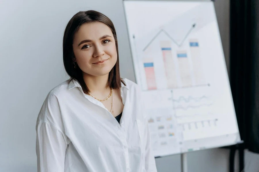 A person standing in front of a whiteboard