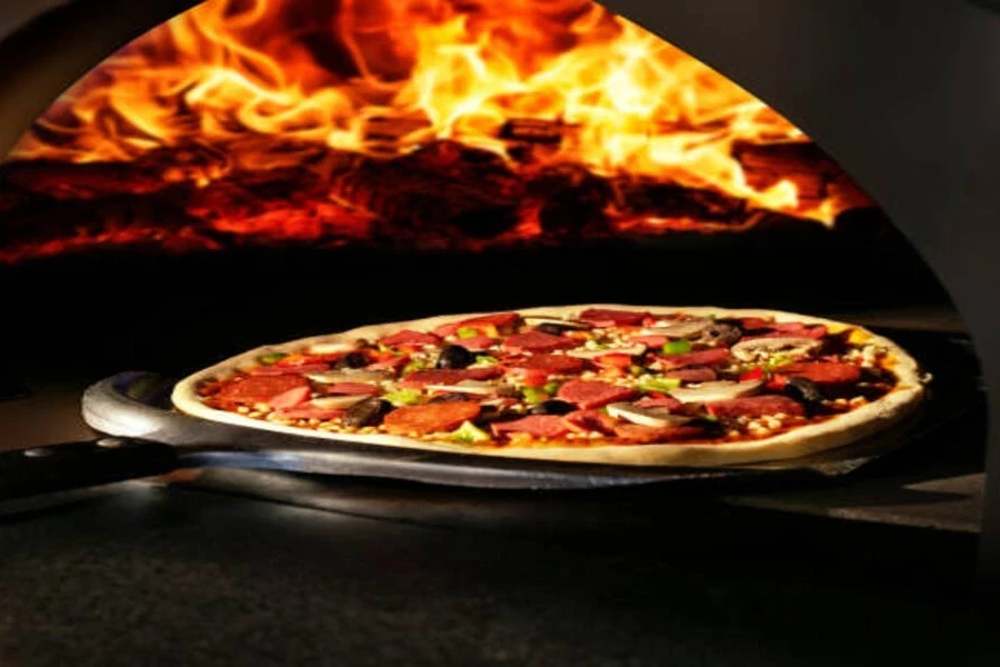 Cast iron pizza stone with perfect pizza in oven