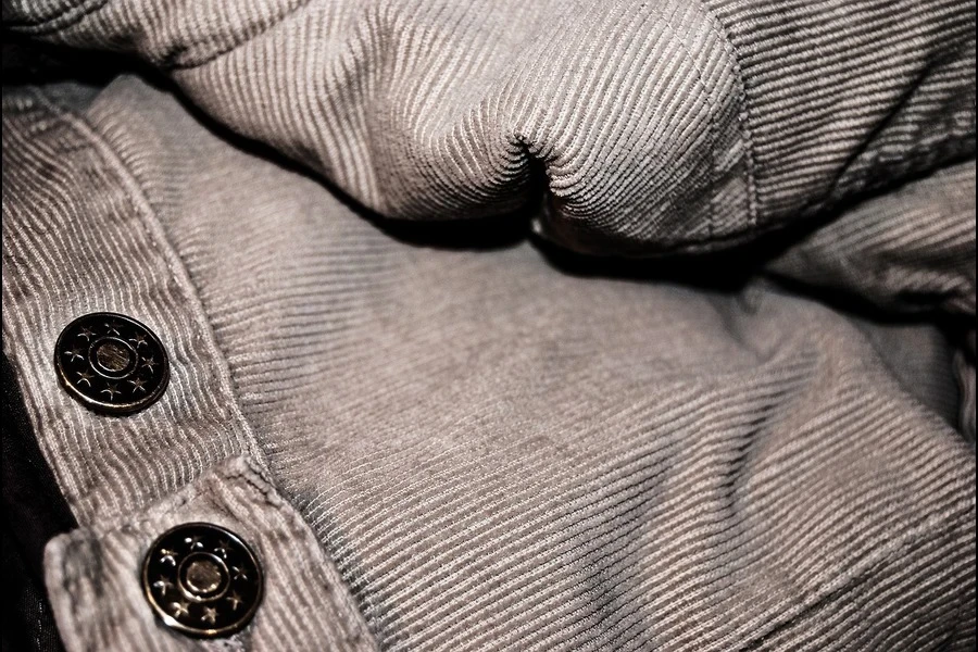 Close-up of a grey corduroy blazer