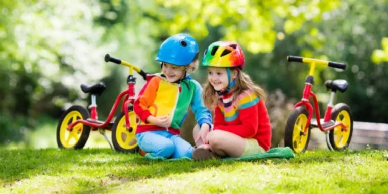 Kids Ride Balance Bike in Park