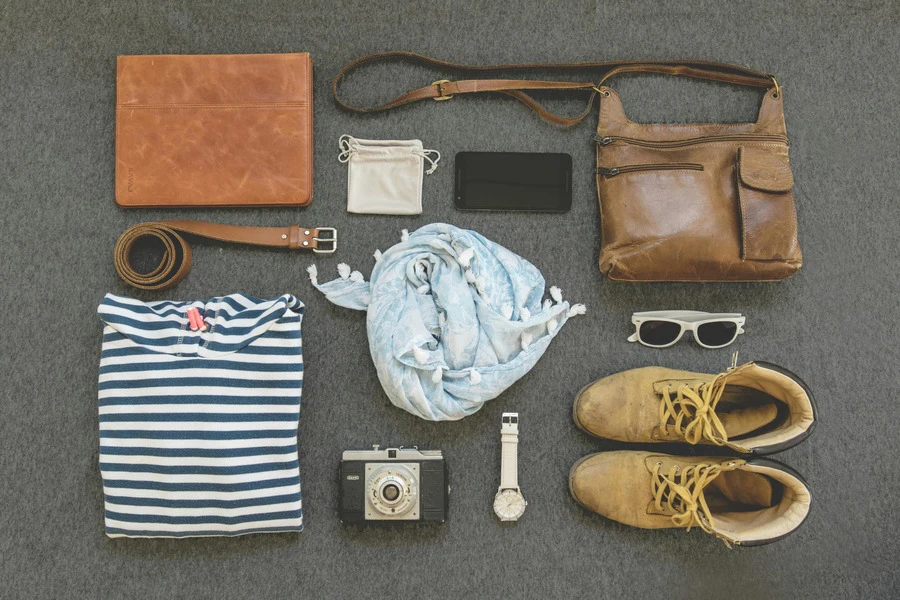 Men’s accessories lying on a carpet