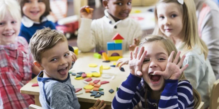 Multiple children having fun making faces