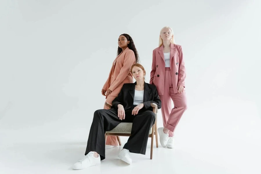 Photo of 3 woman wearing blazers