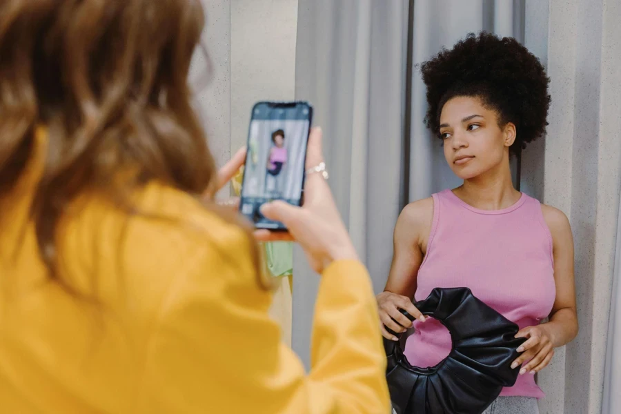 Two Girls are Taking Photos