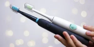 Two electric toothbrushes