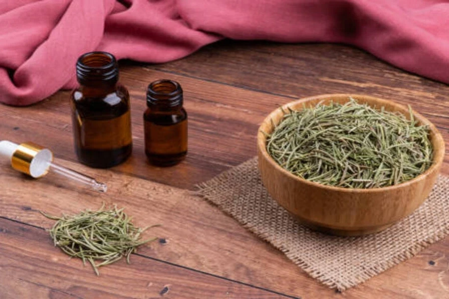 Two vials ready for infusion of fresh rosemary