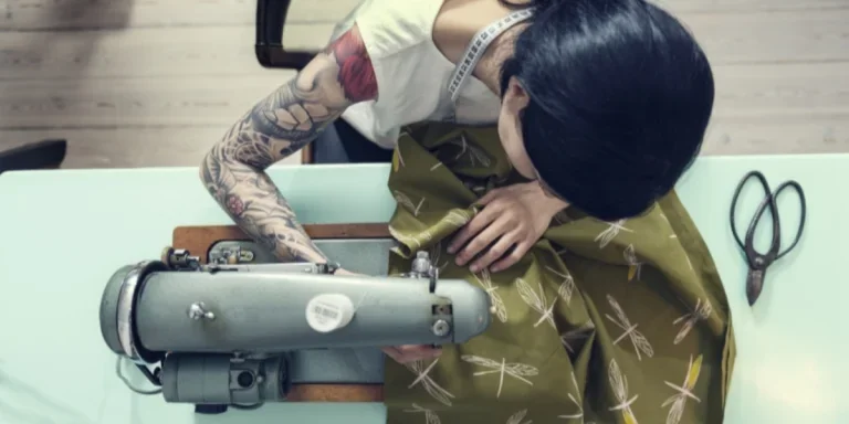 Woman making something with patterned fabric
