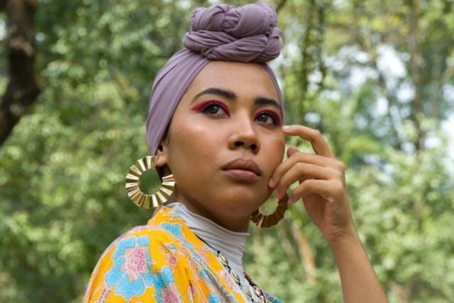 Woman wearing purple dress and Turban hijab