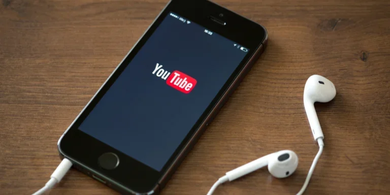YouTube app open on an old iPhone