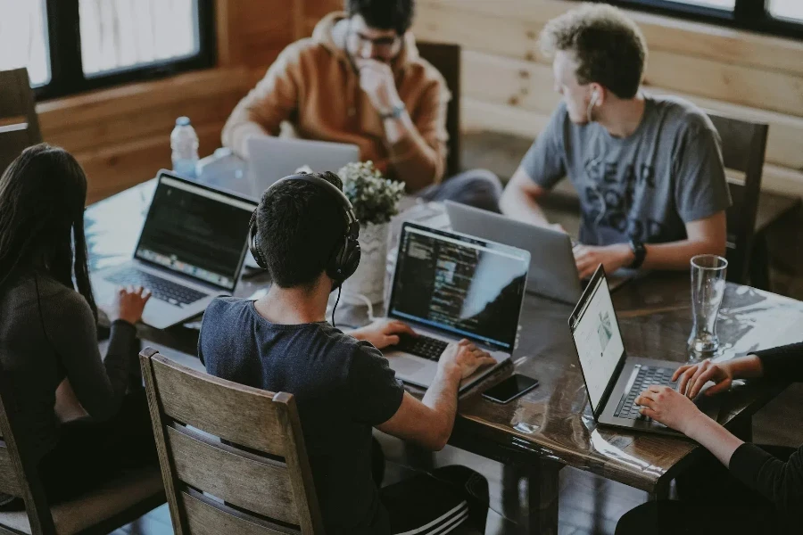 A bunch of people calculating the business asset and financial at the workplace