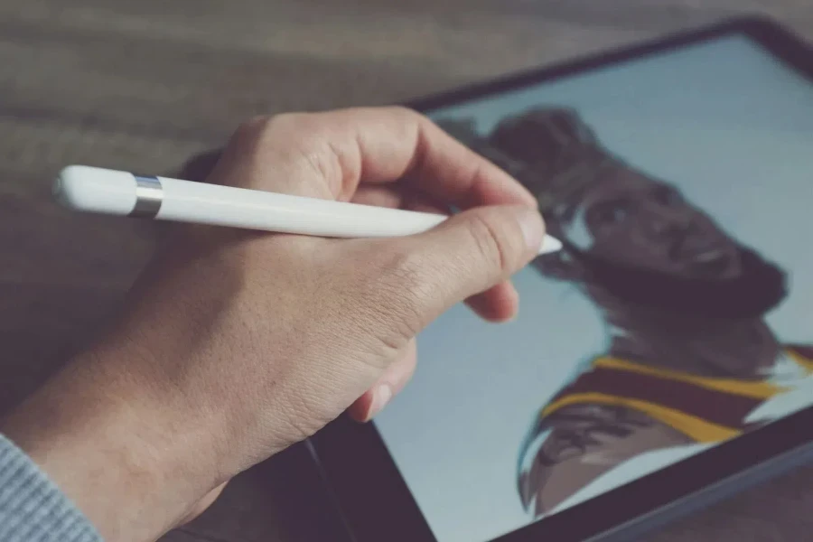 A person making digital art on a tablet