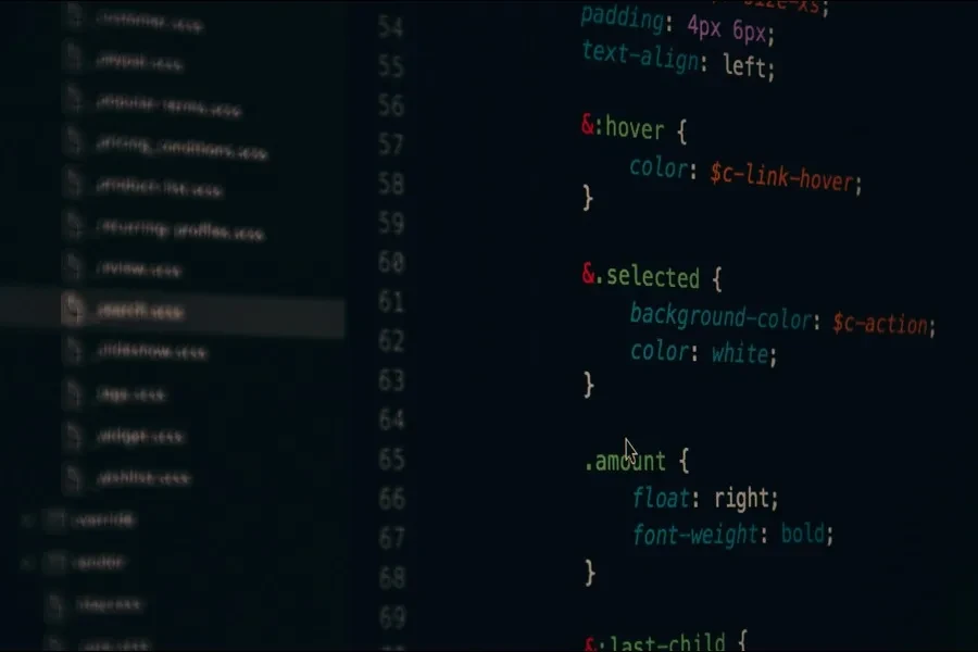 Close-up of codes on a black screen
