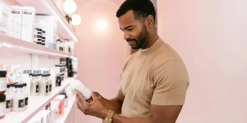 Man selecting products from a shelf