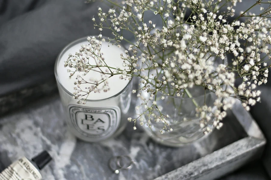 marble tray with flowers and a candle