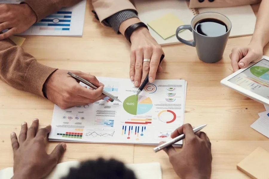 People analyzing data on a table