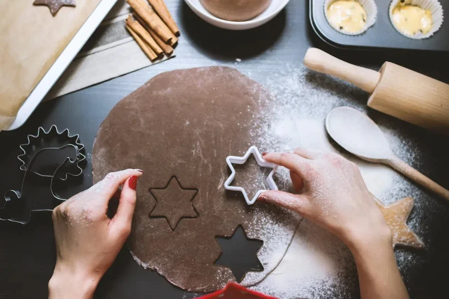 Person holding white hexagonal baking mold