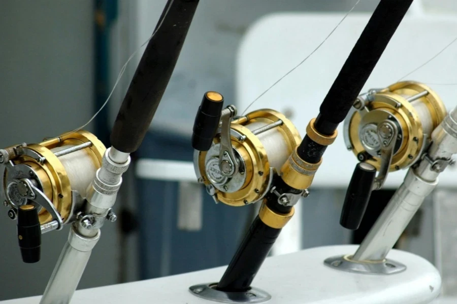 3 Lined Brass and Black Fishing Reel