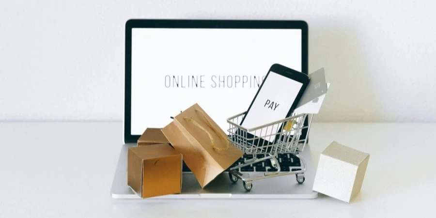 A Miniature Shopping Cart on MacBook Laptop