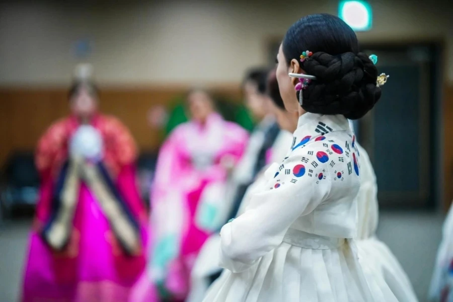 A Woman Wearing a White Hanbok