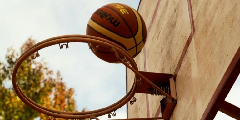 A basketball going through a hoop