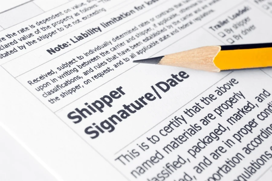 A bill of lading document with a pencil