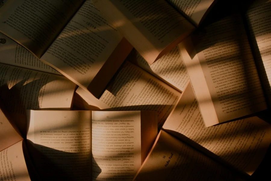 A bunch of open books overlapping