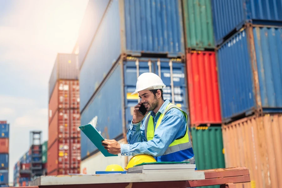 A fast deliver driver checking a bill of lading