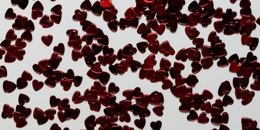 A group of red hearts with Black Forest in the background