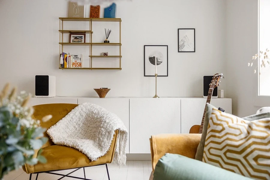 A living room with a couch and a white cabinet