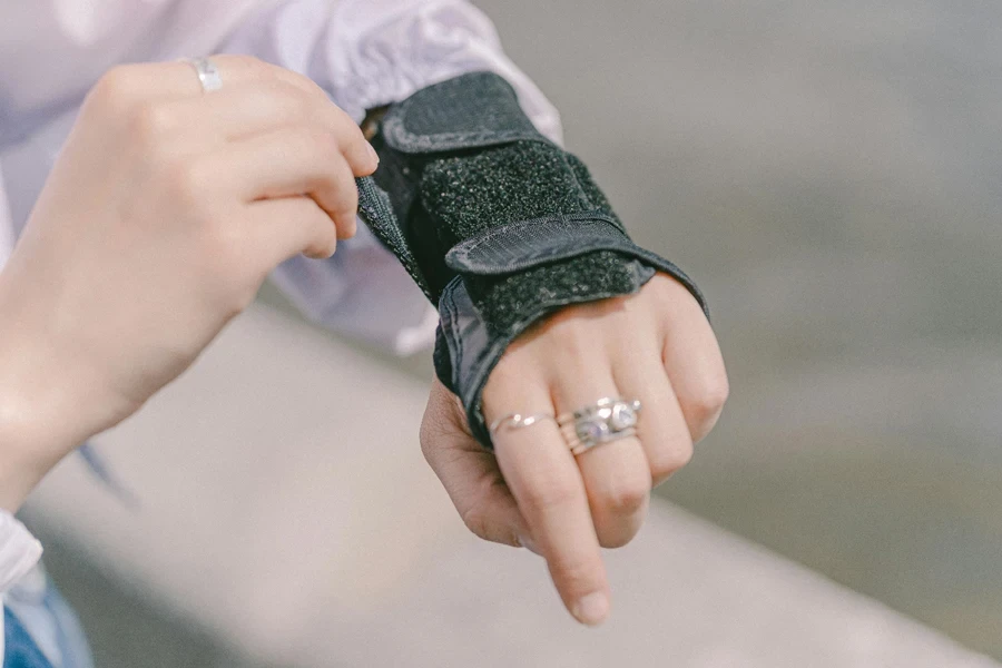 A person wearing a wrist brace