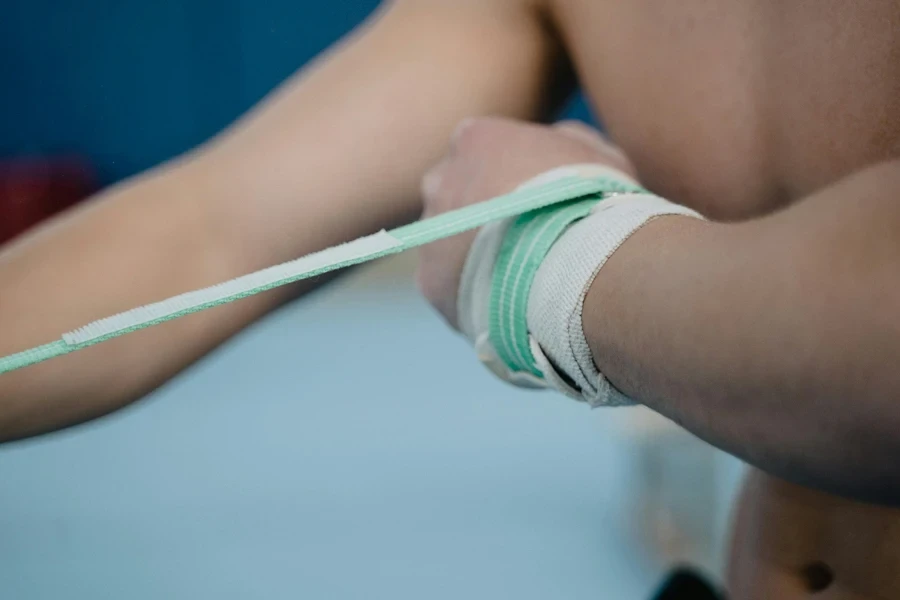 A person's hand wrapped in a tape