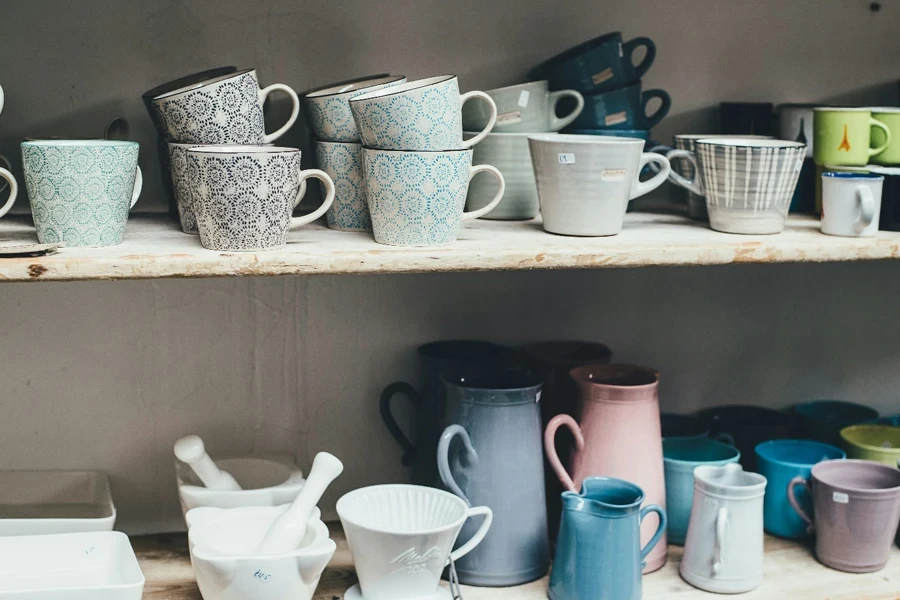 A shelf with cups and mortars