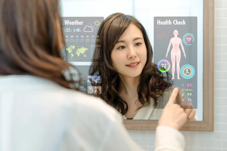 A smiling woman checking her health on a digital mirror