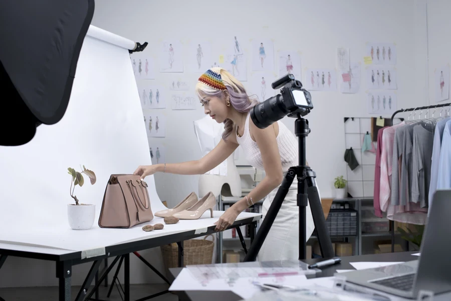 Businesswoman taking fashion product photos