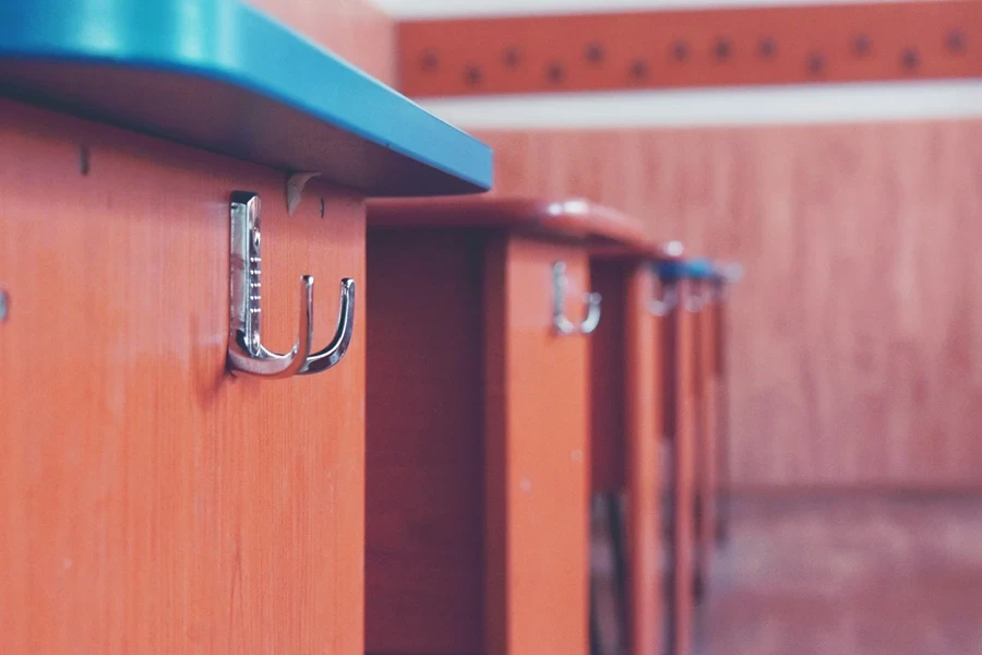 Close-up of a row of desks