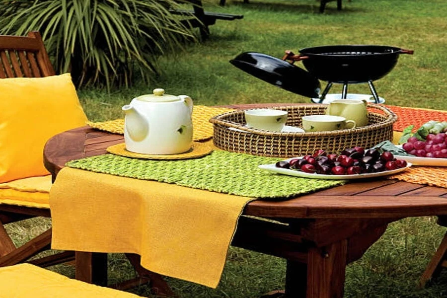 Colorful table placemats on wooden table with drinks