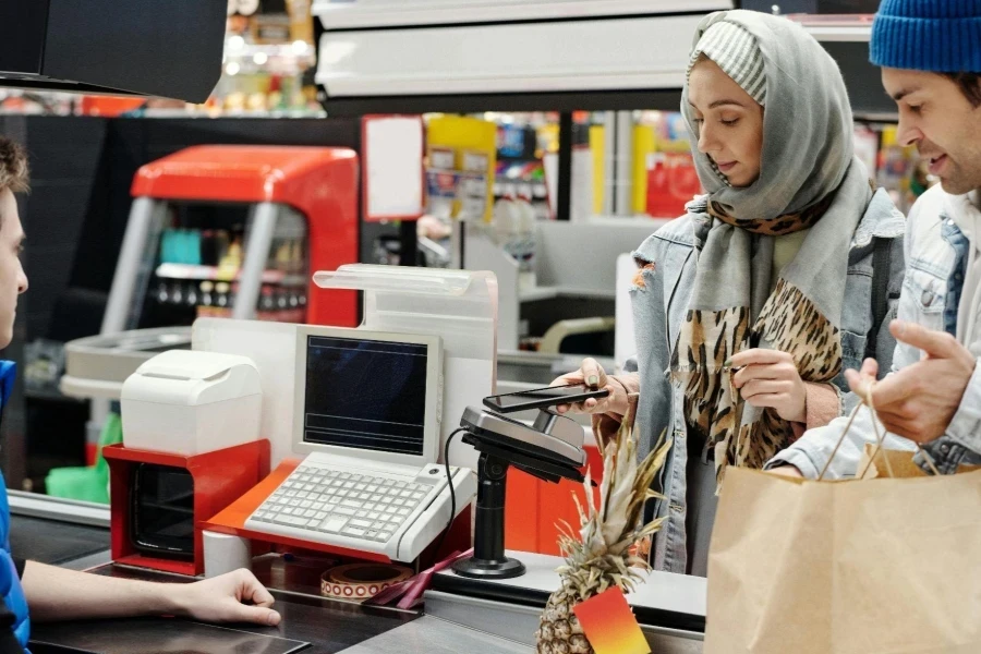 Couple Buying Groceries at a Supermarket