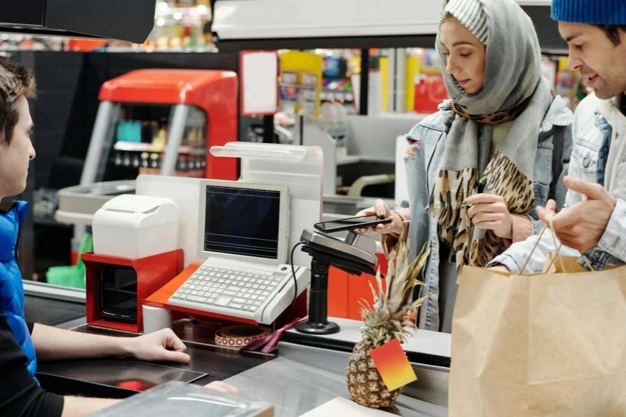 Couple Buying Groceries at a Supermarket