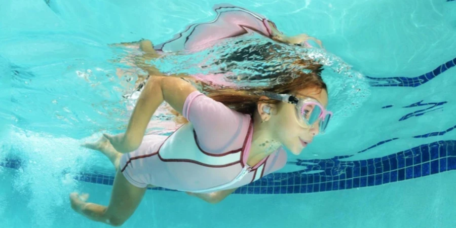 Cute children swimming in pool
