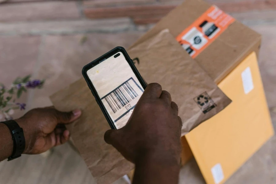 Deliveryman Scanning the Barcode