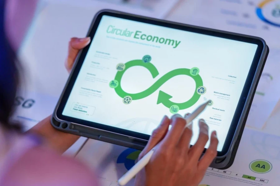 ESG (environment, social,governance) recycle sign on laptop screen with carbon free chart board in office