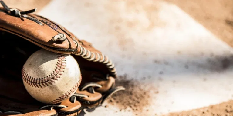 Glove and Ball on Home Plate