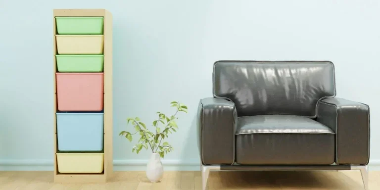 Gray Leather Sofa Chair Beside a Vase and Storage Combination with Boxes